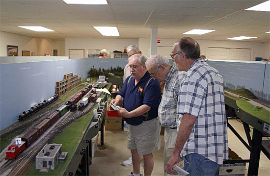 The NCR NMRA board of Directors enjoys a session on the Operations Road Show layout